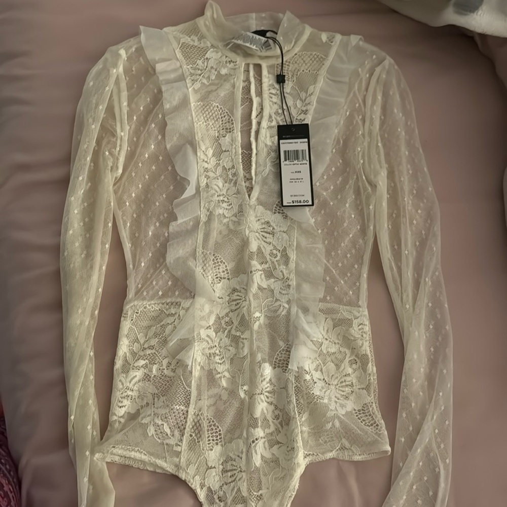 Brand new BCBG Body Suit